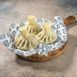 Хинкали с курицей в сливочном соусе