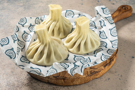 Хинкали с курицей в сливочном соусе