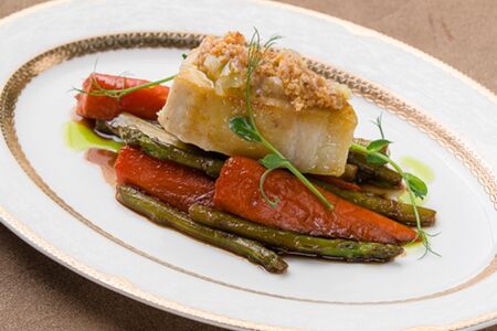 Масляная рыба с овощами