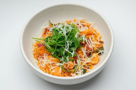 Паста птитим с соусом биск и морепродуктами