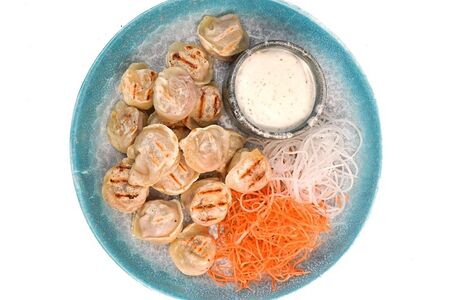 Пельмени мясные жареные с соусом спешиал