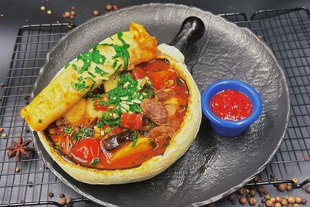 Чанахи под хлебной лепешкой