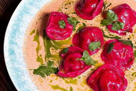 Пельмени в соусе Том ям