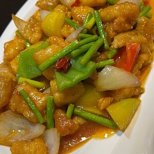 Жареный минтай с овощами