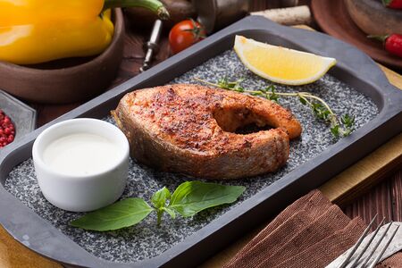 Стейк из морской радужной форели по-сухумски