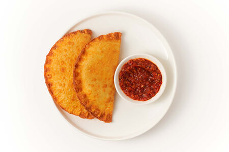 Чебуреки с говядиной и свининой с соусом