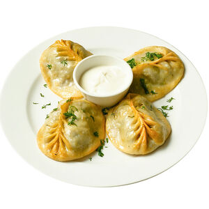 Манты жареные с говядиной и тыквой