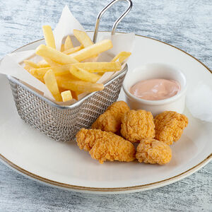 Куриные наггетсы с пикантным соусом