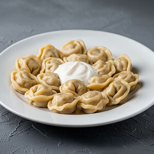 Пельмени по-домашнему со сметаной