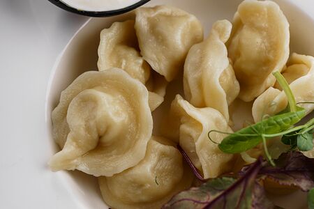 Пельмени со сметаной