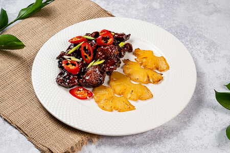 Свинина с грибами в гранатовом соусе