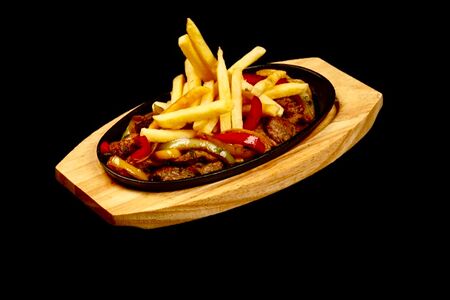 Жареная баранья мякоть с овощами