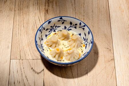 Мини-хинкали в перечном соусе