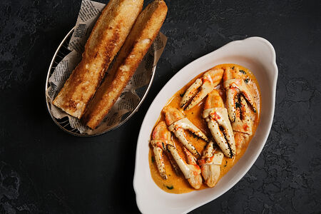 Кулаки краба в фирменном соусе