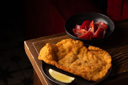 Шницель с томатами