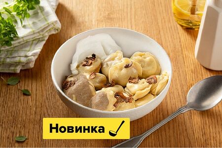 Пельмени с грибным соусом