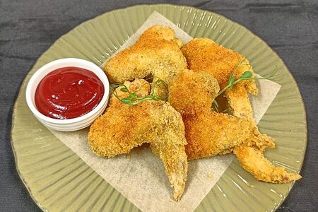Крылышки куриные в сухарях