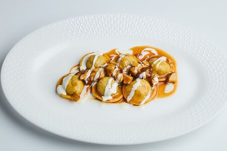 Равиоли с кроликом и белыми грибами