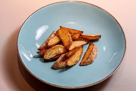 Картофельные дольки запеченные