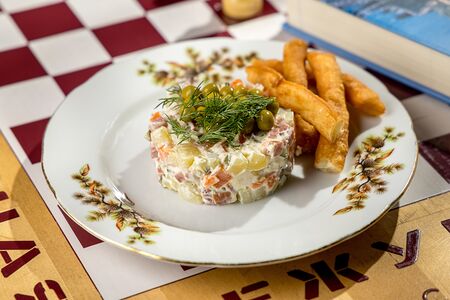 Оливье с колбасой