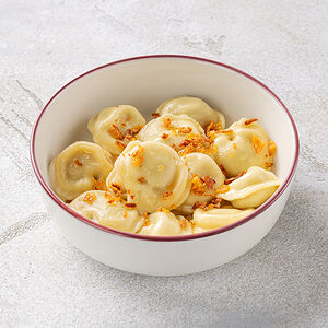 Пельмени со сливочным соусом