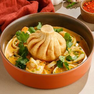 Морепродукты в соусе том ям с рисом