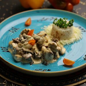 Телятина с грибами под сливочным соусом