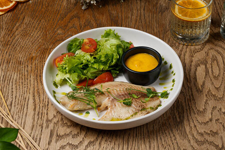 Тилапия с миксом из овощей