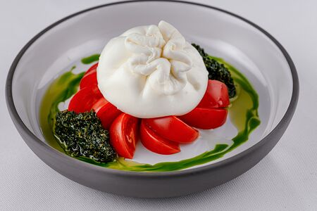 Буррата с бакинским томатами