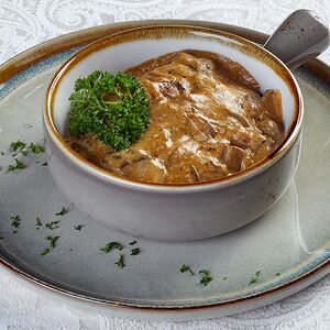 Драники в горшочке с белыми грибами