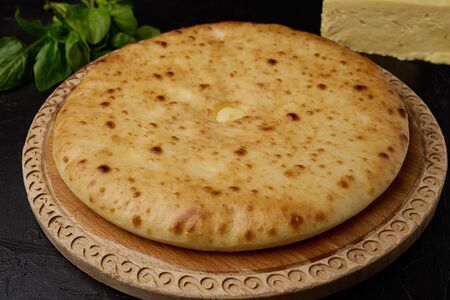Осетинский пирог с сыром и листьями шпината
