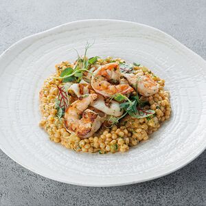 Птитим в сливочно-томатном соусе с морепродуктами