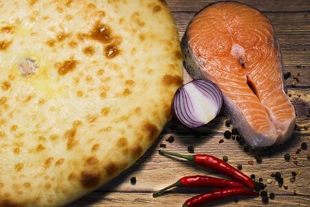Осетинский пирог с семгой и помидорами