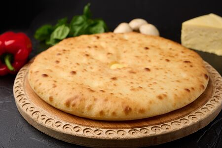 Осетинский пирог с курицей, сыром, грибами и болгарским перцем