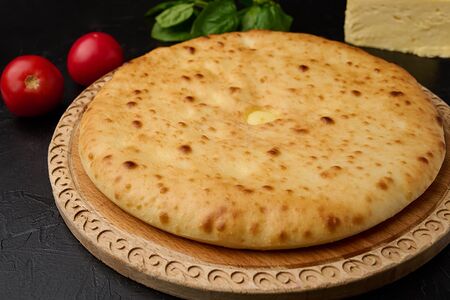 Осетинский пирог с сыром и помидорами