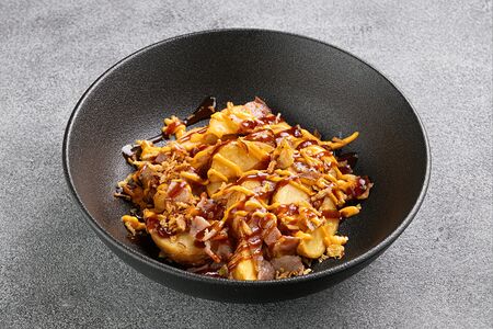 Картофельные дольки с беконом