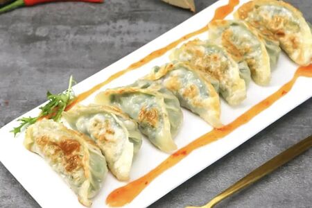 F08 Жареные свиные пельмени 