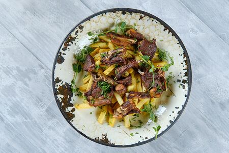 Вагури по-бухарски из ягненка с картофелем фри