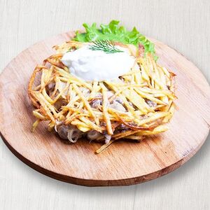 Телятина на картофельных чипсах