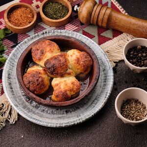 Шапочки шампиньонов, запеченные с сыром