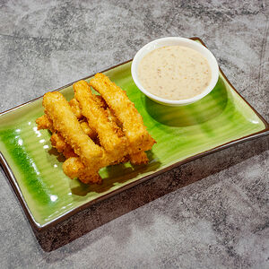 Тофу в кляре с ореховым соусом