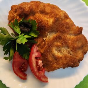 Отбивная в панировочных сухарях 