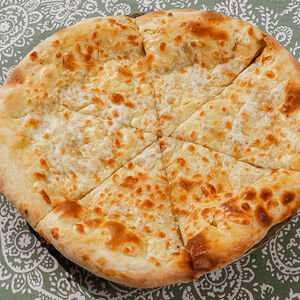 Хачапури по-мегрельски с сыром внутри и снаружи