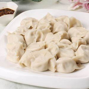 Пельмени со свининой и квашеной капустой