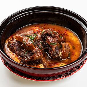 Томленые бычьи хвосты с полентой