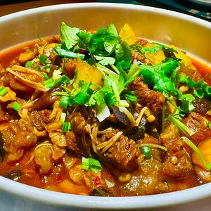 Тушеная говядина с овощами