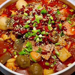 Утиная кровь с овощами в остром бульоне