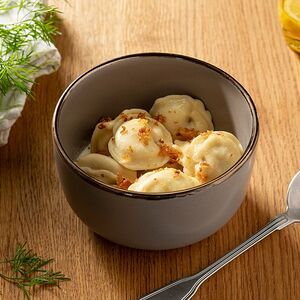 Пельмени со сливочным соусом