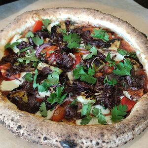 Пицца с говяжьими щечками