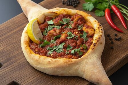 Хачапури по-Аджарски с пряной курочкой в томатном соусе